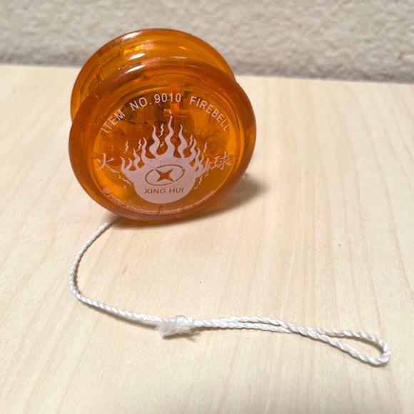 Yoyo and Hackysac toy set. Orange Yoyo, blue & black Hacky-Sac. - Picture 2 of 5